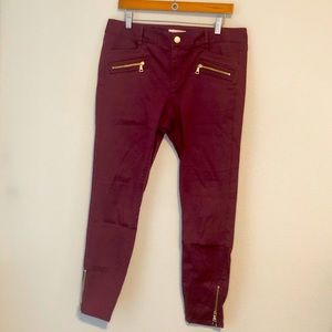 Burgundy skinny ankle-zip pants